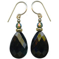 A pair of teardrop-shaped drop earrings with faceted dark iridescent beads and gold filled ear wires, shown on a plain white background.