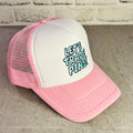Pink and white trucker hat with 'Let's Trade Pins' text