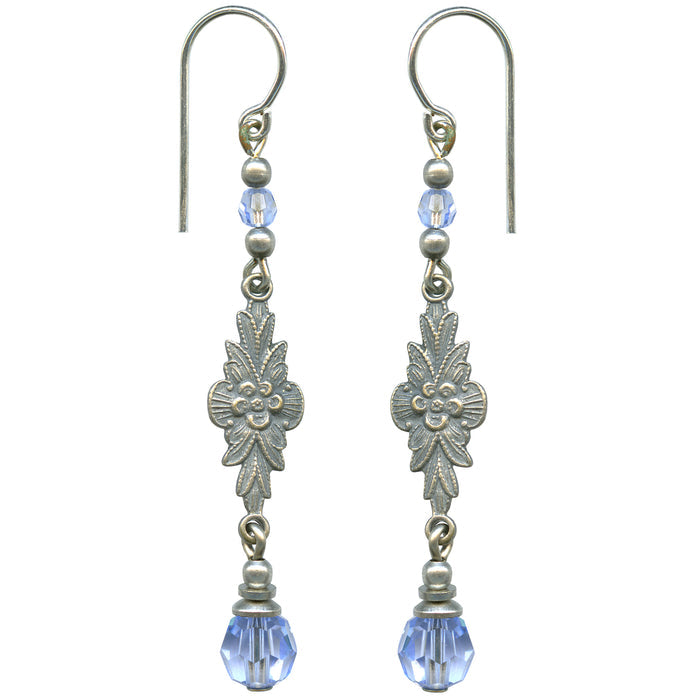 Elegant "GRACE 1" Owen Glass Collection earrings featuring light sapphire crystal and intricate filigree design.