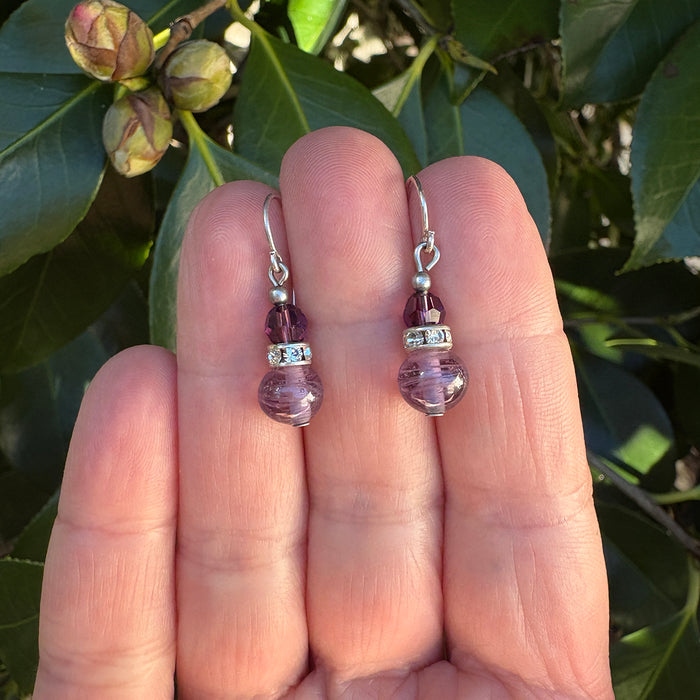 Owen Glass Collection MINI FLASH 7" amethyst glass, crystal, and rhinestone earrings with a sparkling, elegant design.
