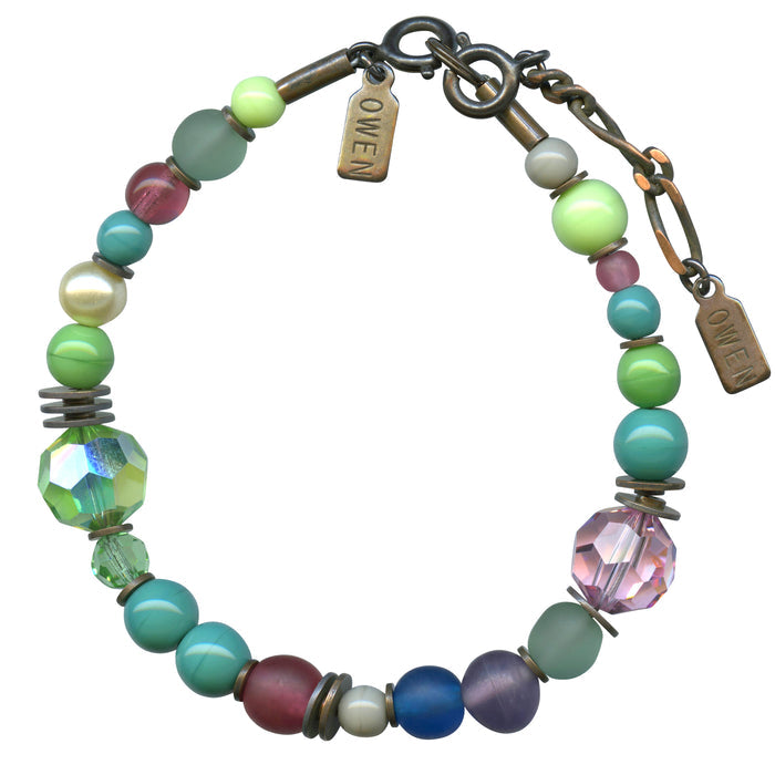 Owen Glass Collection Motion in the Ocean bracelet featuring ocean-inspired beads and silver accents on a delicate chain.