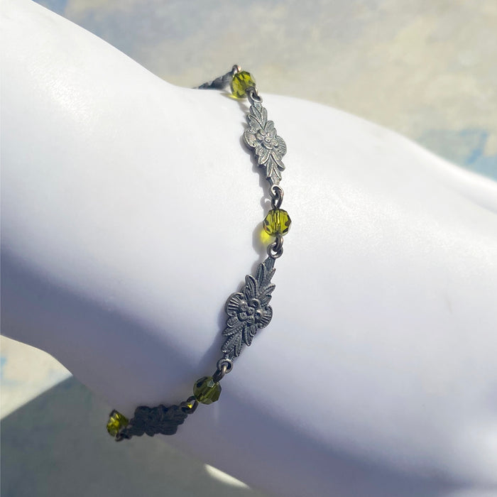 Olivine Austrian Crystal bracelet with intricate filigree design from Owen Glass Collection, titled "Grace 7."