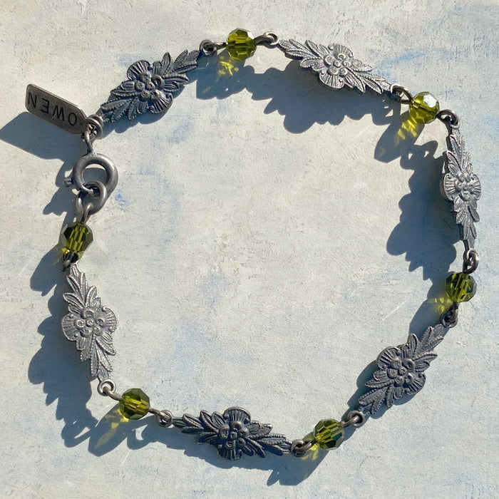 Olivine Austrian crystal bracelet with intricate filigree design from Owen Glass Collection, showcasing elegant craftsmanship.