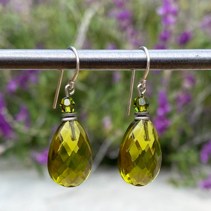 Owen Glass Collection High Street 8 earrings featuring sleek silver hoops with intricate cutout design.