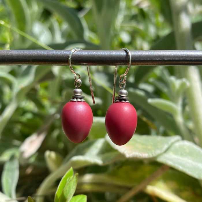 Opaque red glass drop earrings with sterling silver accents from Owen Glass Collection, featuring berry-shaped design.