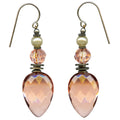 Elegant silver earrings from the Owen Glass Collection featuring intricate glass detailing and a polished finish.