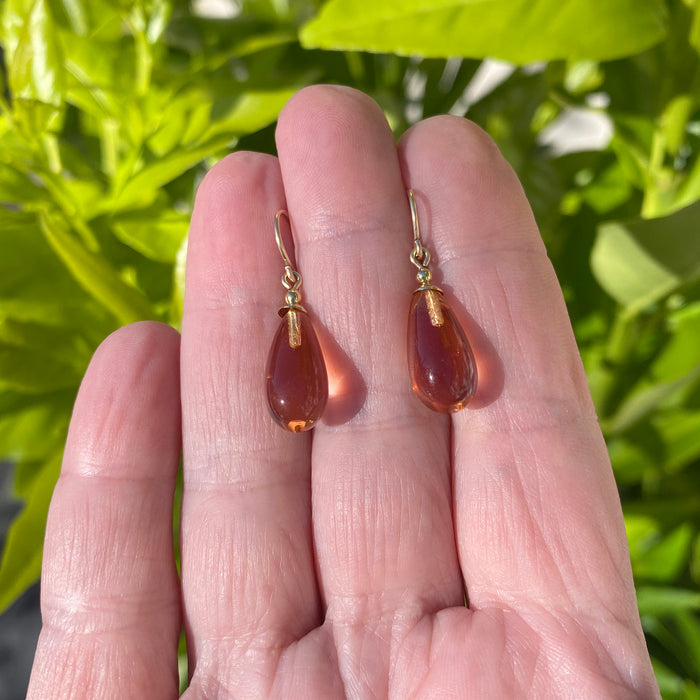 Peach German glass and gold dangle earrings from Owen Glass Collection with bright, vibrant design and elegant gold accents.