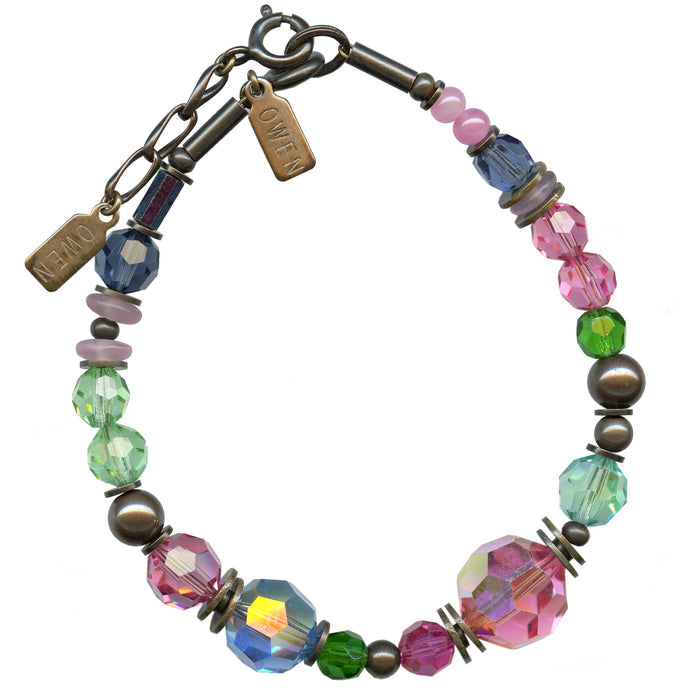 Pink and aqua crystal beaded bracelet from Owen Glass Collection with "Time Scales" design, featuring colorful beads and intricate details.