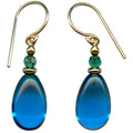 Turquoise glass and gold earrings from Owen Glass Collection, featuring raindrop design with elegant, shiny glass and gold accents.
