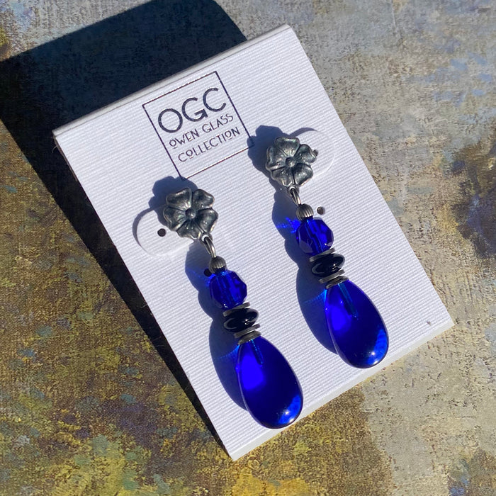Cobalt glass and Czech glass post earrings featuring raindrop design from Owen Glass Collection, showcasing vibrant blue and clear glass.