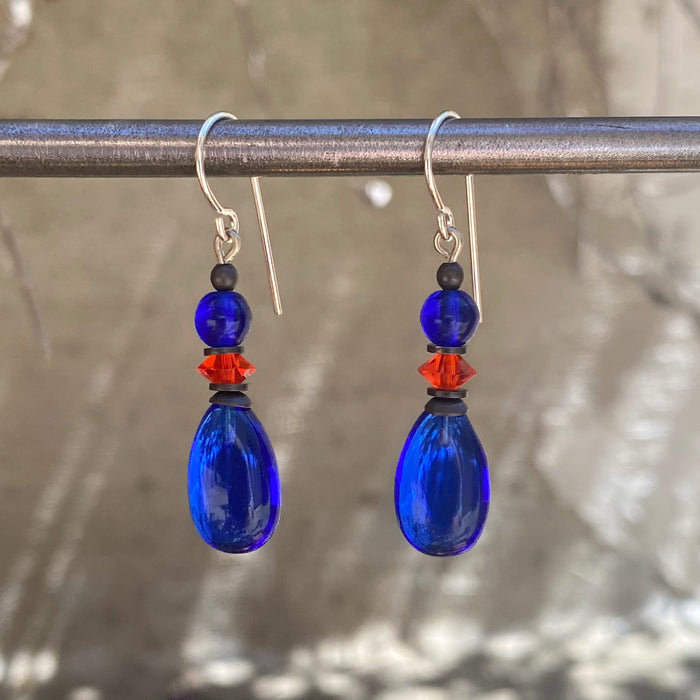 Cobalt glass dangle earrings with raindrop design from Owen Glass Collection, featuring elegant, translucent glass drops.
