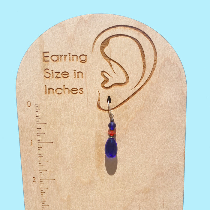 Cobalt glass dangle earrings with raindrop design from Owen Glass Collection, featuring a sleek, polished finish and elegant style.