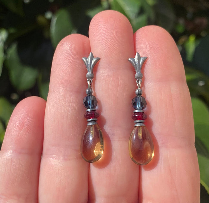 Owen Glass Collection Raindrops 77 light smoke topaz and indigo crystal post earrings with glass drops and intricate detailing.