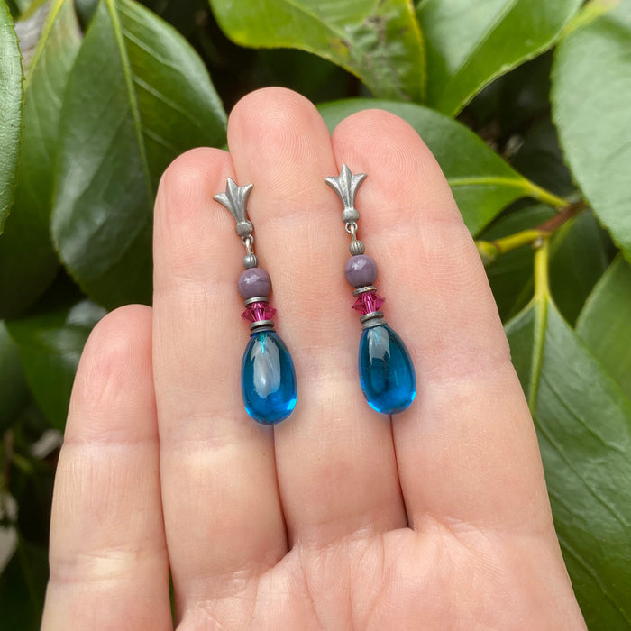 Dark turquoise glass post earrings with raindrop design from Owen Glass Collection, showcasing elegant, handcrafted jewelry.