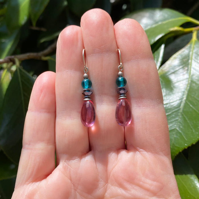 Light pink glass drop earrings featuring raindrop design from Owen Glass Collection, elegant jewelry accessory.