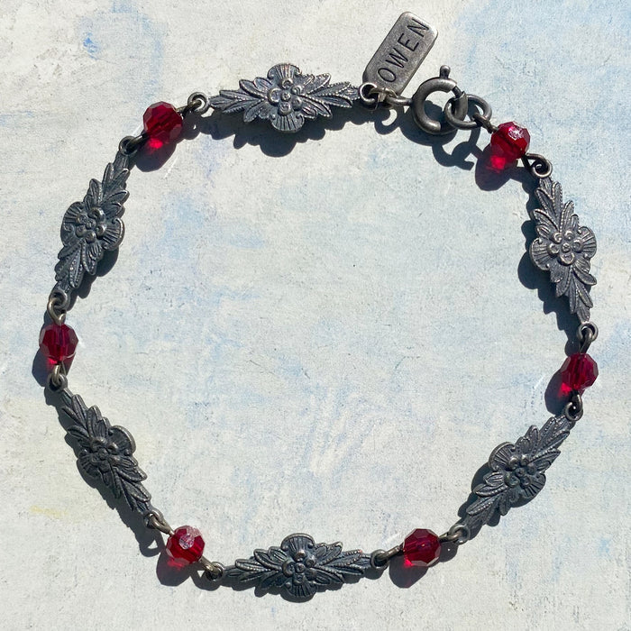 Red Austrian crystal bracelet with intricate filigree design from Owen Glass Collection, showcasing elegant craftsmanship.