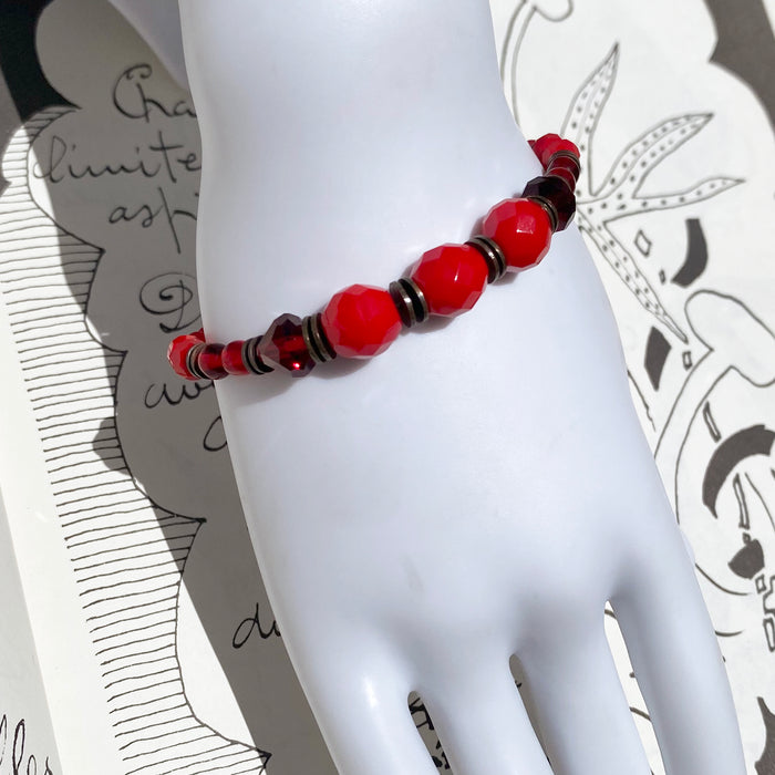 Beaded bracelet with red tones, Czech glass, crystal, and bronze beads from Owen Glass Collection.