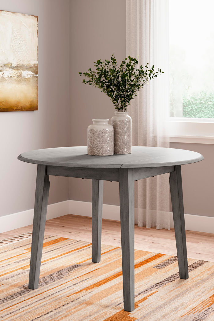 Shullden Gray Round DRM Drop Leaf Table - Brand New