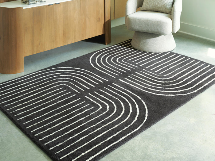 Signature Design Medium Rug 4.96 FT by 6.81 FT
