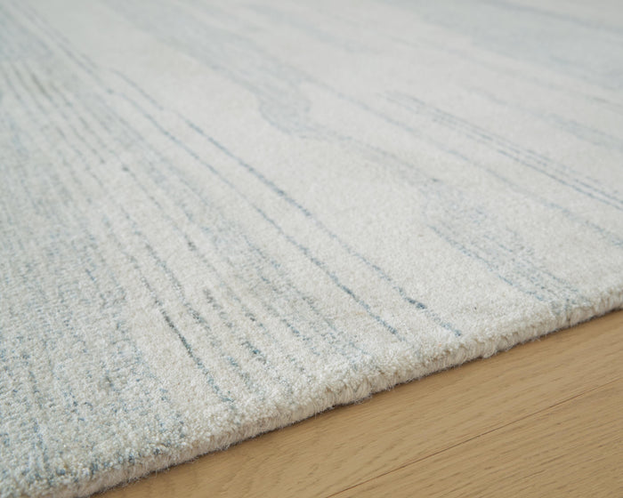Signature Design Medium Rug 5.06 FT by 6.93 FT