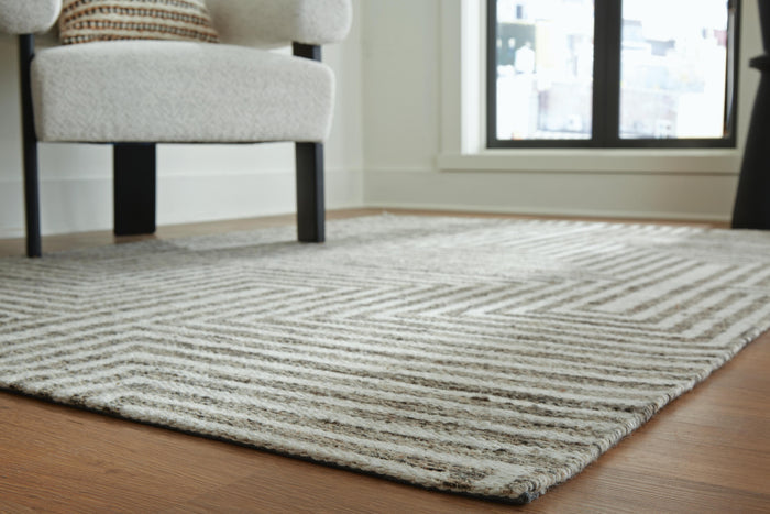 Signature Design Medium Rug 5.09 FT by 7.08 FT
