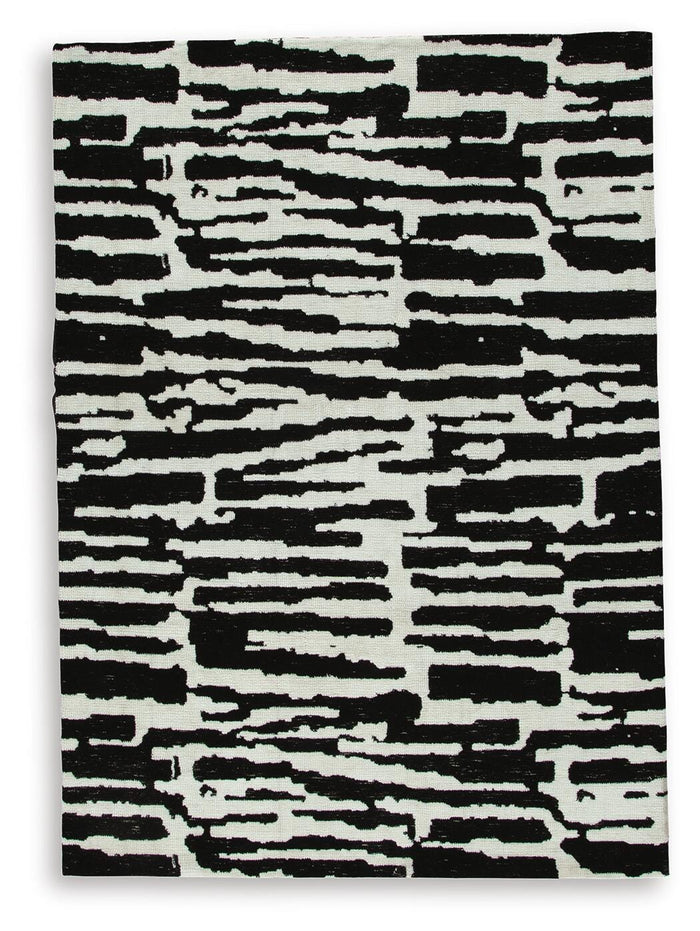 Signature Design Medium Rug 5.19 FT by 6.72 FT
