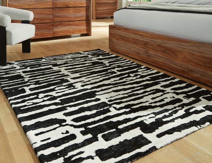 Signature Design Medium Rug 5.19 FT by 6.72 FT