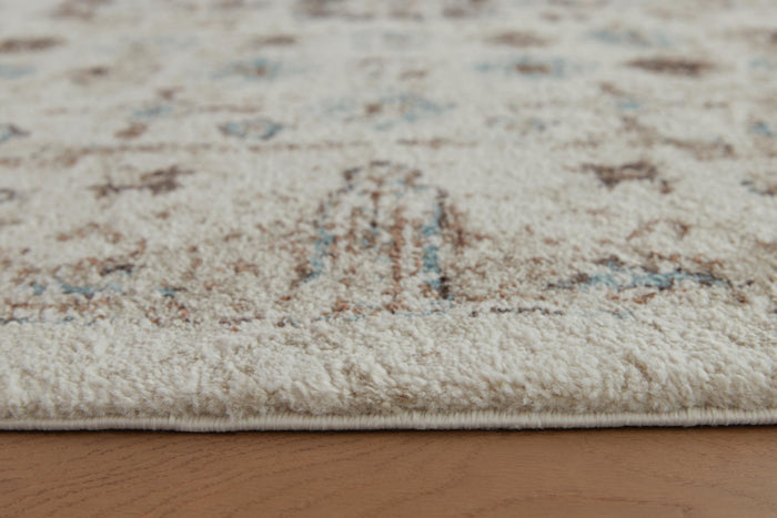 Signature Design Medium Rug 5.23 FT by 6.92 FT
