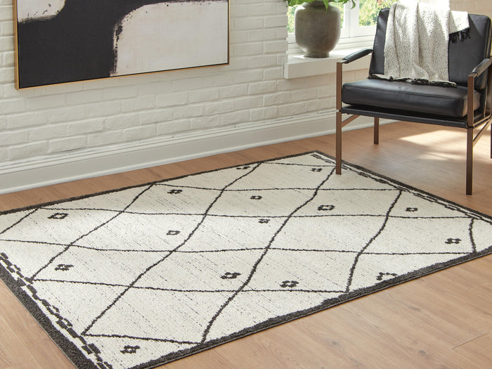 Signature Design Medium Rug 5.27 FT by 7.06 FT