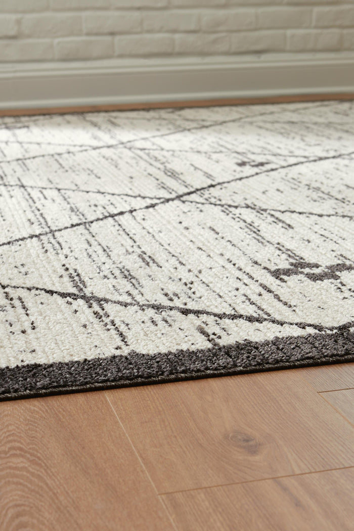 Signature Design Medium Rug 5.27 FT by 7.06 FT