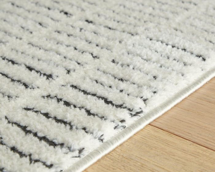 Signature Design Medium Rug 5.33 FT by 7 FT