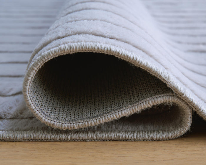 Signature Design Washable Medium Rug 5.04 FT by 6.98 FT