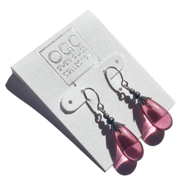 Silver Brights 3 pink glass dangle earrings by Owen Glass Collection featuring shiny silver hooks and vibrant pink glass drops.