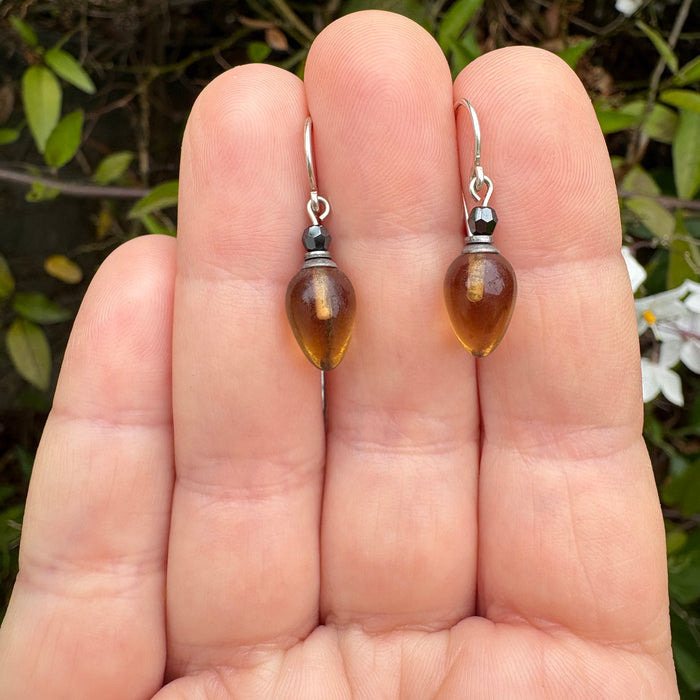 Smoke Topaz glass and hematite crystal dangle earrings from Owen Glass Collection with purple plum accents and silver hooks.