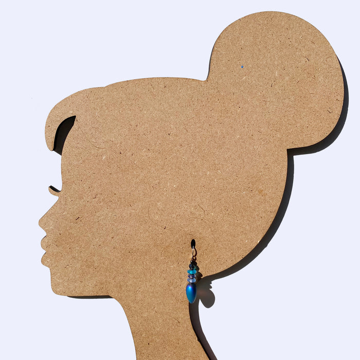 Owen Glass Collection Tango 66 iridescent blue dangle earrings featuring shimmering, colorful glass teardrop design.
