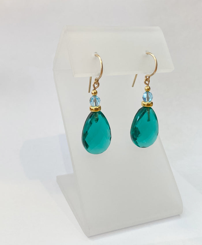 Owen Glass Collection High Street 35 earrings featuring modern geometric silver designs with intricate cutouts.