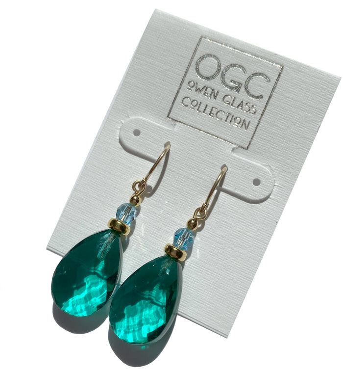 Owen Glass Collection High Street 35 earrings with sleek, modern design in a close-up shot highlighting the stylish jewelry.