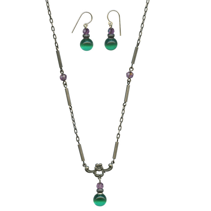 Owen Glass Collection Hyde Park 7 earrings and necklace set featuring elegant jewelry with intricate designs and matching pieces.