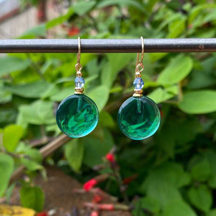 Teal glass and blue crystal dangle earrings with gold accents from Owen Glass Collection, featuring a window-inspired design.