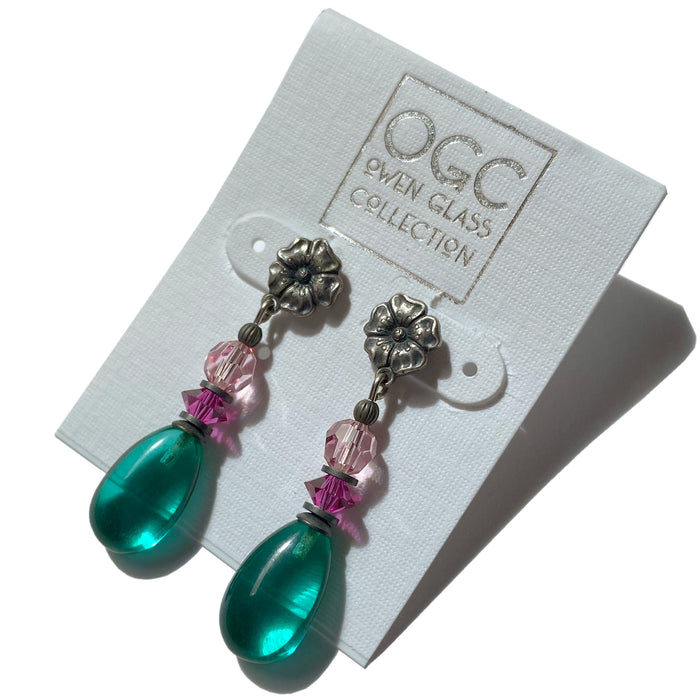 Teal glass and fuchsia Austrian crystal post earrings with raindrop design from Owen Glass Collection, showcasing colorful, elegant jewelry.