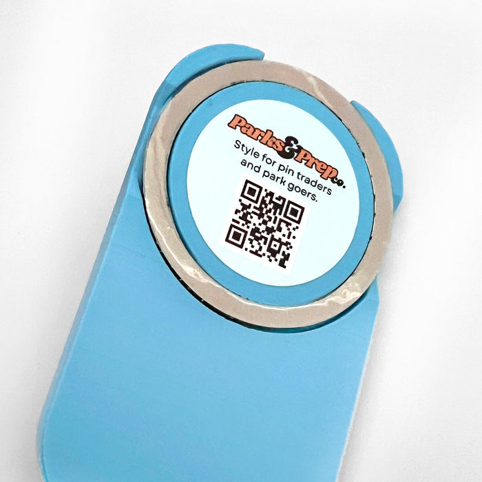 A blue plastic magsafe compatible power bank sleeve and Fuel Rod holder for theme park external chargers.