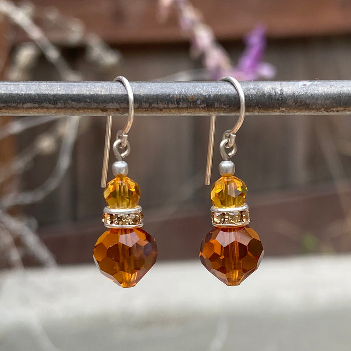 Owen Glass Collection Topaz crystal and rhinestone dangle earrings with sparkling design, perfect for elegant occasions.