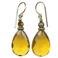 Owen Glass Collection High Street 22 earrings featuring elegant, modern design with gold-tone accents and intricate detailing.