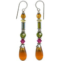 A pair of long dangle earrings with silver french wires and faceted beads in amber, yellow, green, pink, and large topaz teardrop drops, shown on a plain white background.
