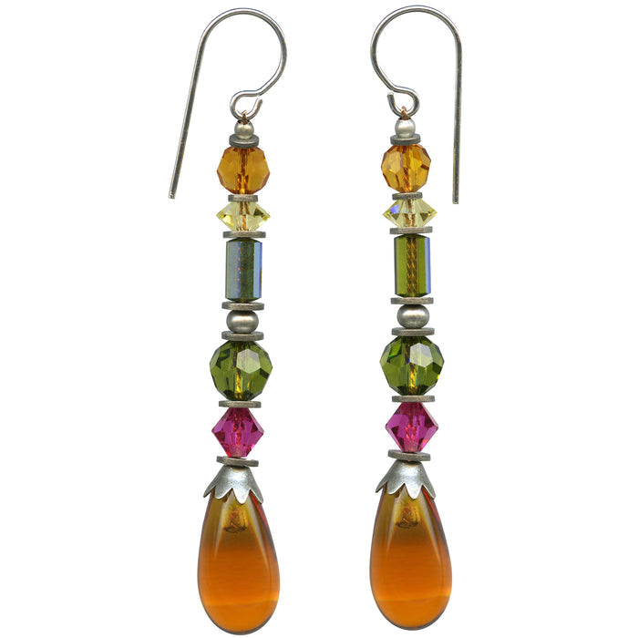 A pair of long dangle earrings with silver french wires and faceted beads in amber, yellow, green, pink, and large topaz teardrop drops, shown on a plain white background.