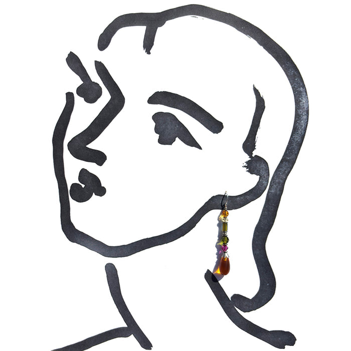 A minimalist black line drawing of a woman's head in profile on a white background, with a dangling colorful beaded earring hanging near the ear.