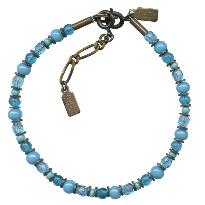 Turquoise beaded bronze bracelet from Owen Glass Collection featuring bright blue beads and silver accents.