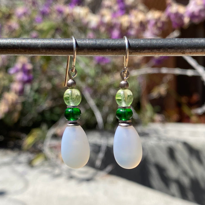 White frosted glass dangle earrings with yellow and emerald Czech glass raindrop accents by Owen Glass Collection.