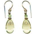 Yellow glass and peridot crystal drop earrings with raindrop design from Owen Glass Collection, showcasing elegant jewelry.
